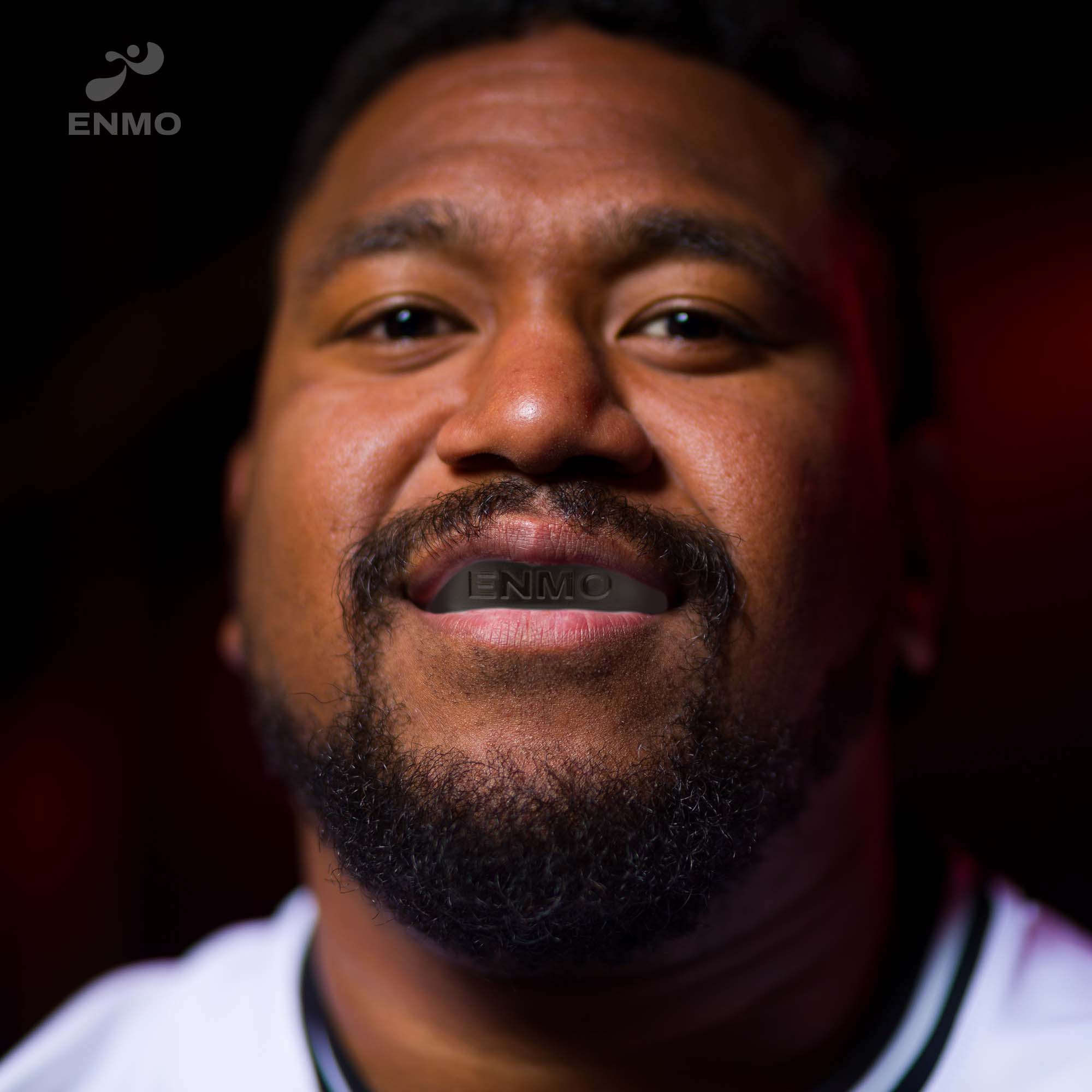 Men Wearing Enmo Maxilla Gel Mouthguard - Adult, Black/red