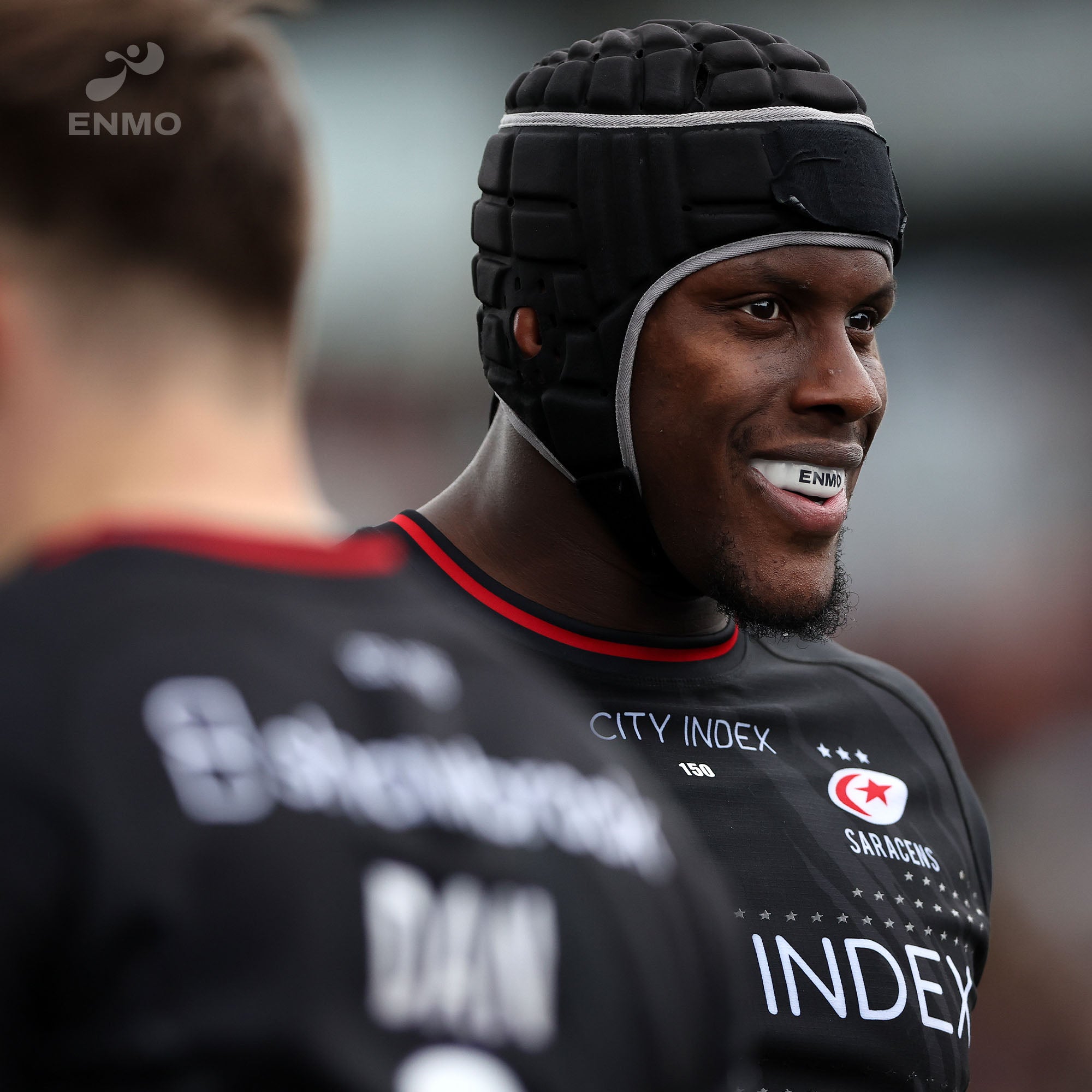 Saracens rugby player wearing enmo gum shield and head protection.