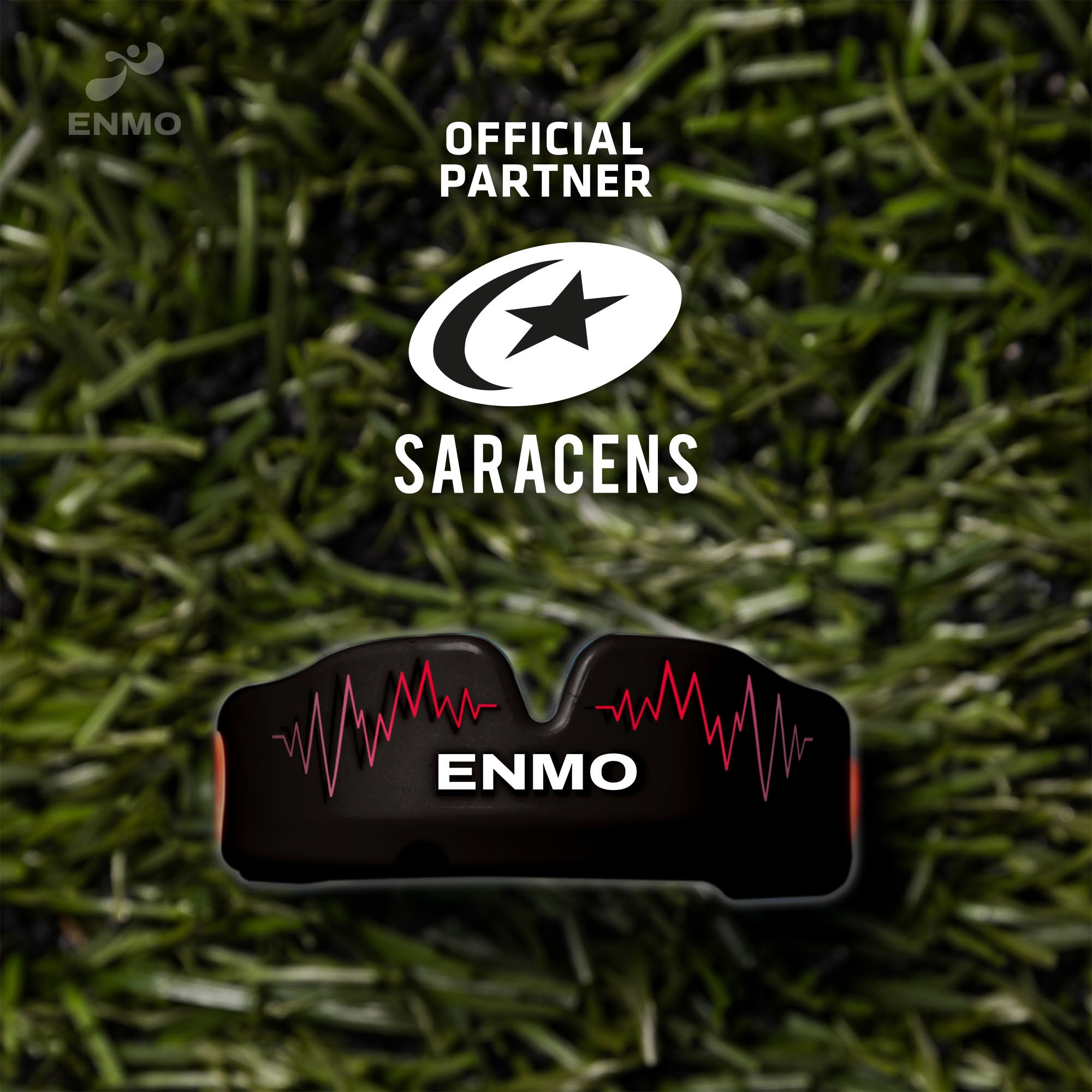 Enmo Maxilla Pro Mouthguard in Radio Black/Red displayed on grass with Saracens rugby club logo